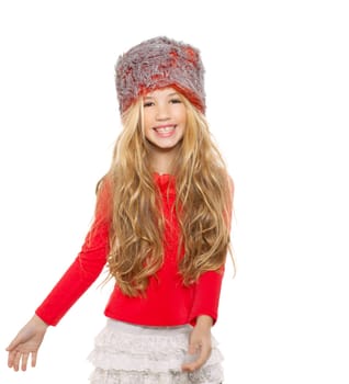 kid girl winter dancing with red shirt and fur hat on white background