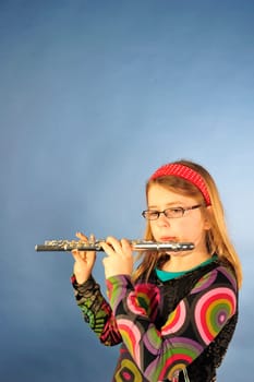 Girl plays flute