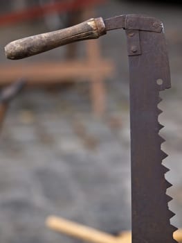 old ,rusty sow waiting for lumberjack