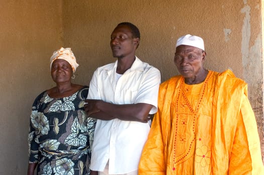 African family of Burkina Faso in front of their house with Ouagadougou