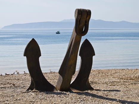 old anchor on the beach