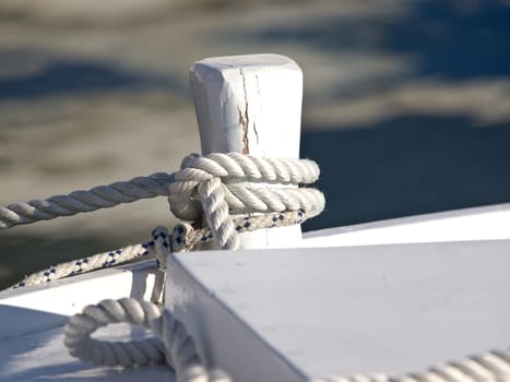 ropes on the boat docked in the harbour