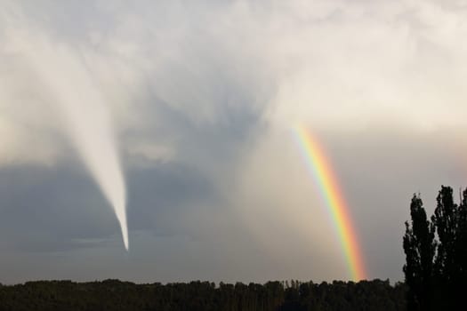 Tornado and rainbow