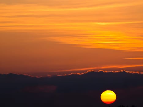 sunset and clouds on red sky