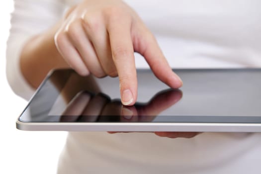 Hand of a woman using a digital tablet on white