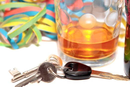 glass of whiskey and car keys on white background depicting drunk driving and addictions can kill