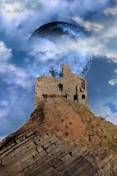 ballybunion castle on the rocks in the west coast of ireland in front of a full moon