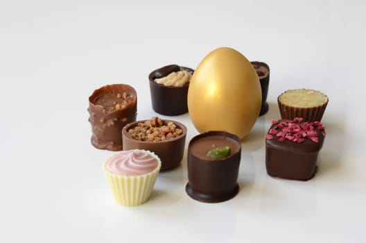 Gold egg and chocolates