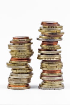 two coins euros stacks isolated on white background