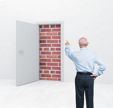 standing old man and door with brick wall