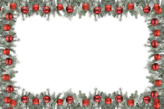 christmas frame made from pine branch and ornaments on white