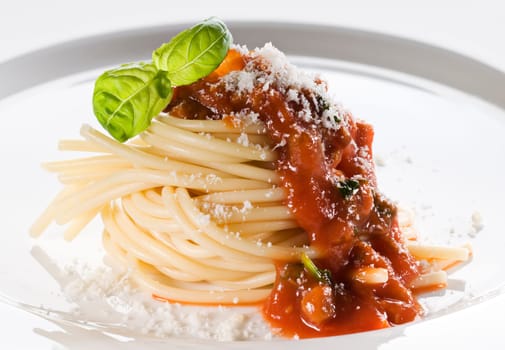 Pasta with tomato sauce and parmesan close up