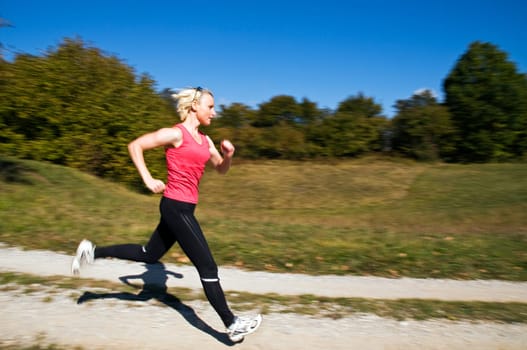 Young woman running outdoor close up shoot