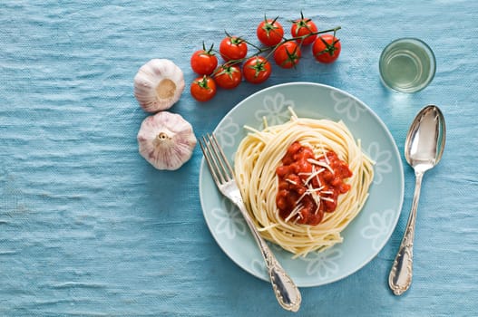 Fresh spaghetti with tomato sauce close up