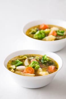 Fresh hot vegetable soup close up shoot