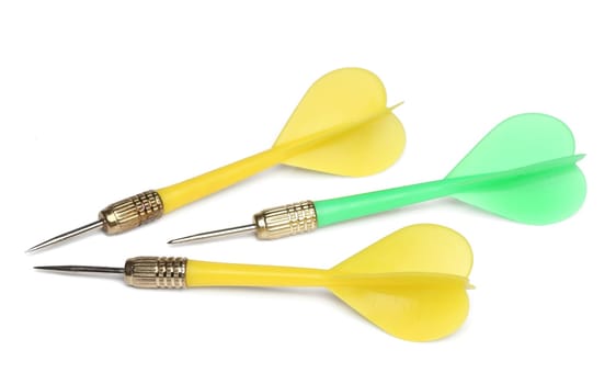 Three darts over white background