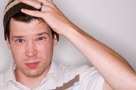 Man Holding Head