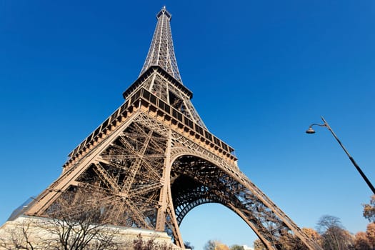 The famous Eiffel tower with blue sky in Paris