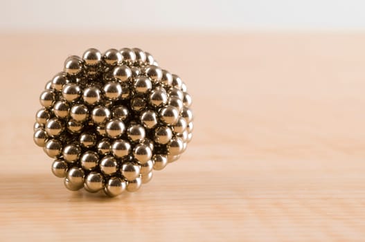 Ball of Magnets on Table.