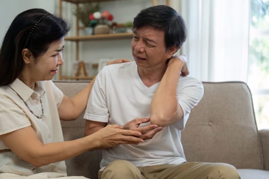 An elderly couple comforts each other during health issues, showcasing their deep emotional connection and support.