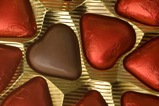 chocolate candy in golden box close up shoot