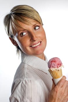 young blond woman eating ice cream close up