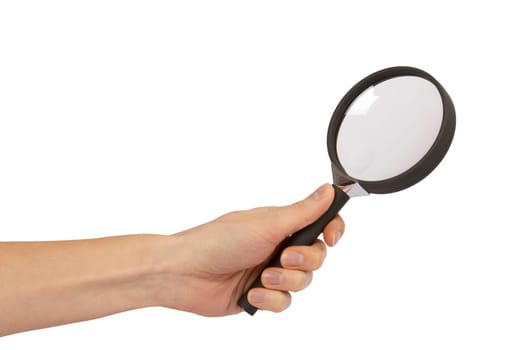 Female hand holding a magnifying glass