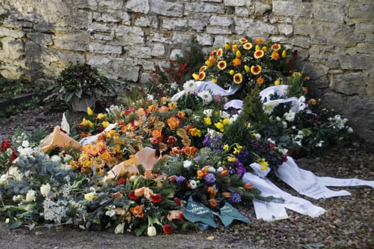 Floral decorations on a fresh grave