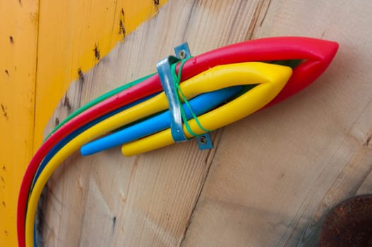 cable on cable drum containing four cables in different colors