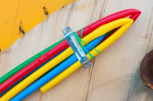 cable on cable drum containing four cables in different colors