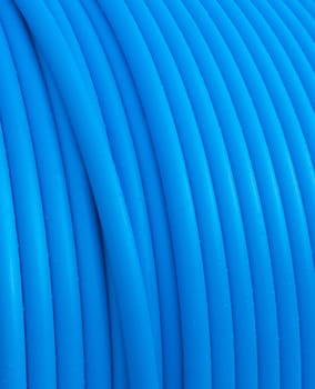 close-up op blue cable on a cable drum