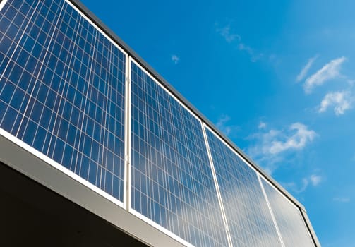 solar panels against a blue sunny sky