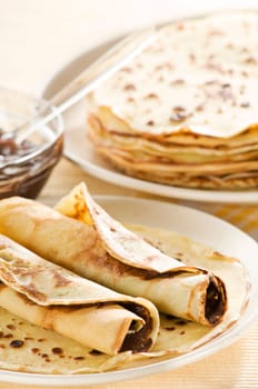 Fresh pancakes with chocolate close up shoot