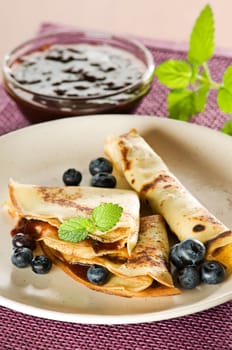 Fresh pancakes with blue berry fruit close up