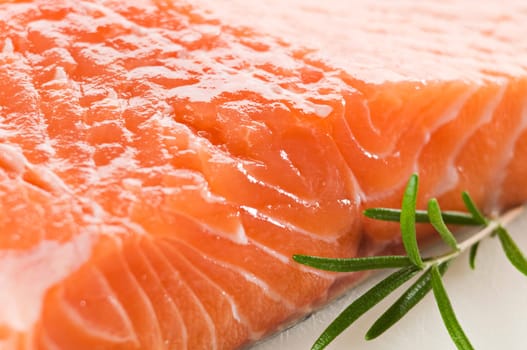 Fresh salmon steak on a plate close up