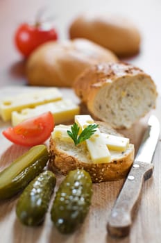 Fresh snack with bread, cheese and tomato close up