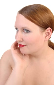 A closeup head shoot of a beautiful woman with brunette hair and red lips, looking away for white background.