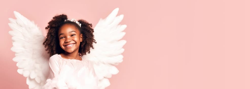 Banner of african american girl in white angel halloween costume looking at camera and smiling over pink background. Happy Halloween. Trick or treat