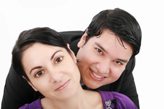 Close-up of beautiful young couple isolated on white background