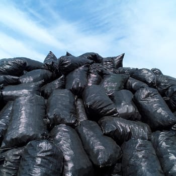 Large group of Garbage Bags towards blue sky