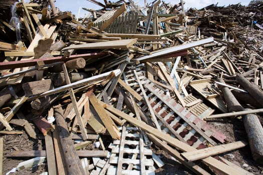 Heap of Wood Garbage in front of blue sky