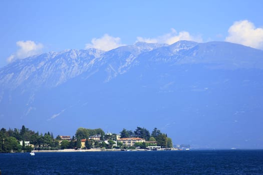 View over Lake Garda to the massif of Monte Baldo,Italy