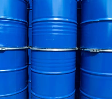 Blue oil drums full frame