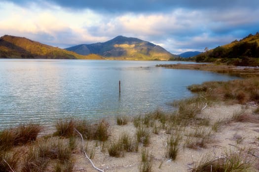 Beautiful evening scene at a lake shore in New Zealand