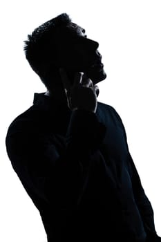 one caucasian man  telephone surprised portrait silhouette in studio isolated white background
