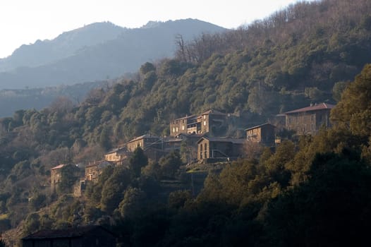landscape of the Cevennes, detached houses in the mountain.