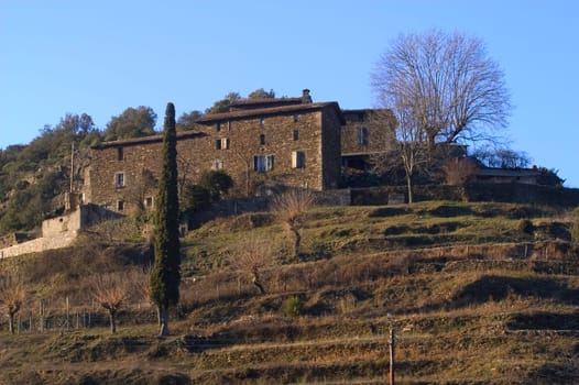 landscape of the Cevennes, detached houses in the mountain.
