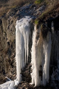 cascade cold on the edge of the mountain road in the Cevennes. In France in the department of Gard