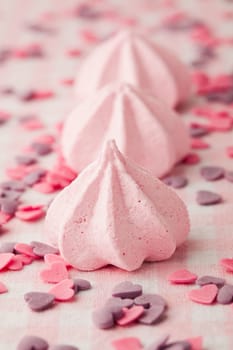 Close-up of delicious pink meringue. Studio shot.
