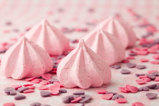 Close-up of delicious pink meringue. Studio shot.